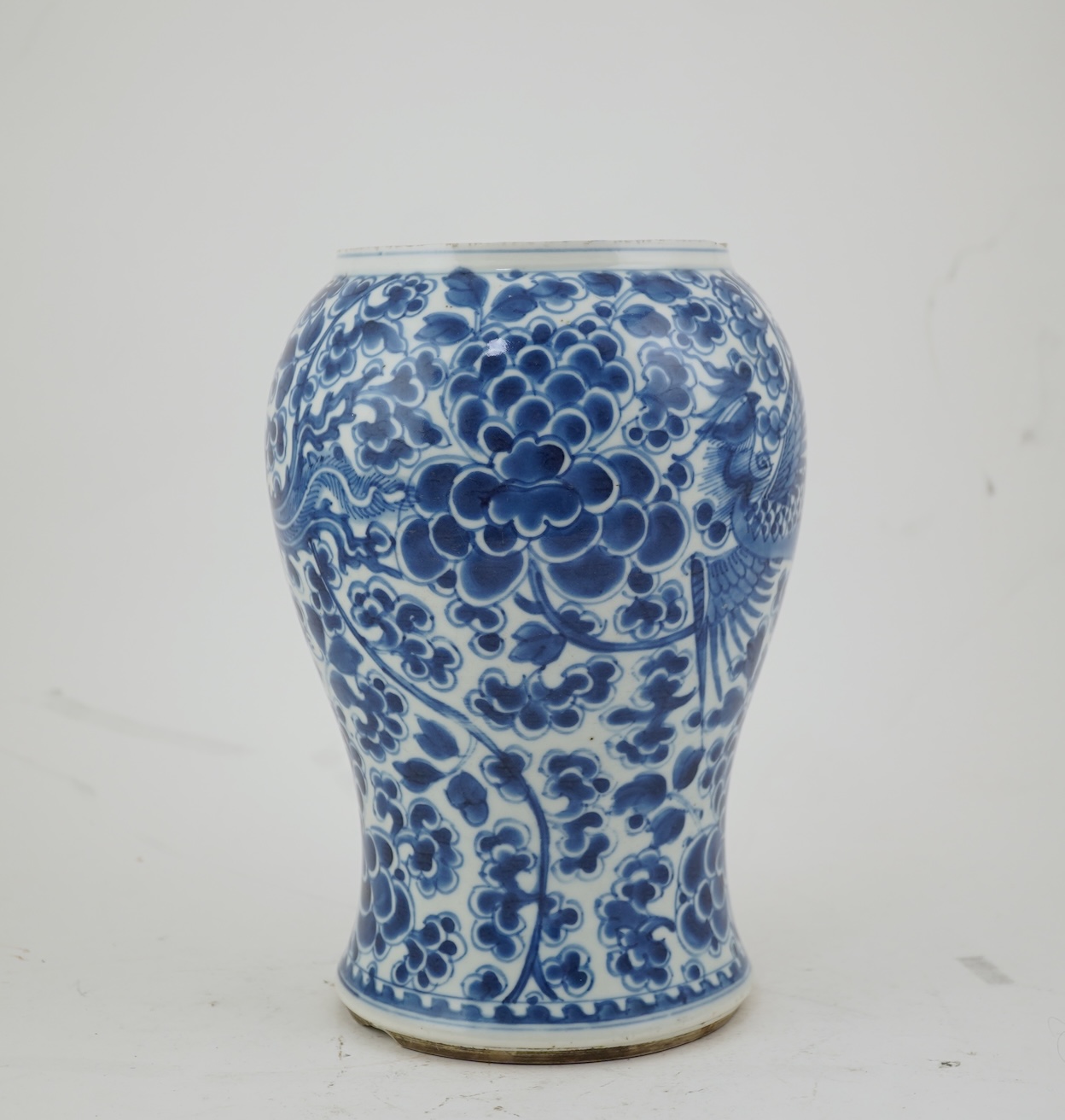 A Chinese blue and white ‘phoenix and peony’ baluster vase, Kangxi period
